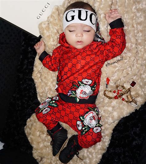 gucci baby clothes for cheap|newborn baby wearing gucci.